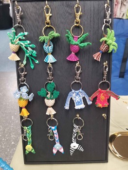 a display with woven keychains.